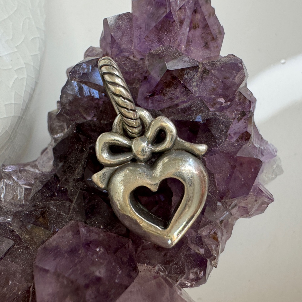 Brighton heart charm with a bow